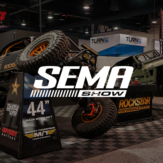 SEMA Logo Overlayed on background image of SEMA show